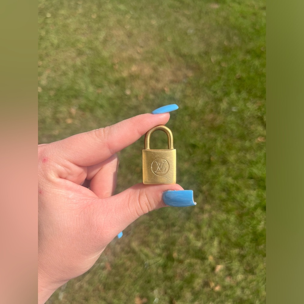 Louis Vuitton authentic gold lock #205